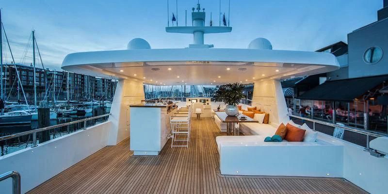 a large room with a large deck and a pool aboard SEAWOLF Yacht for Sale