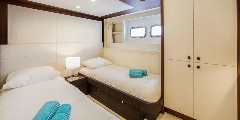 a room with two beds aboard SEAWOLF Yacht for Sale