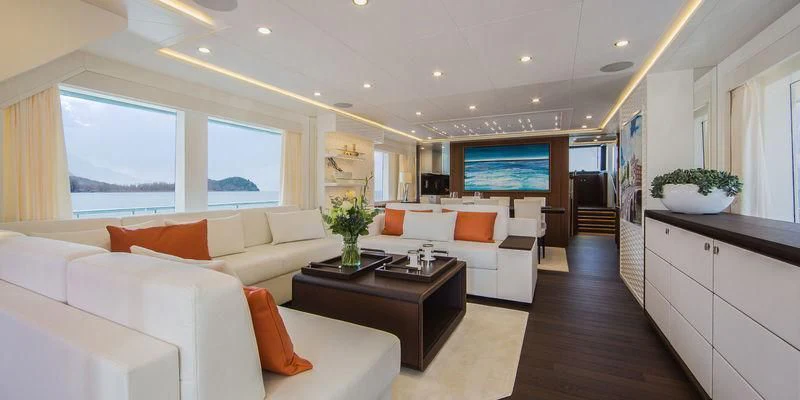 a living room with a large window aboard SEAWOLF Yacht for Sale