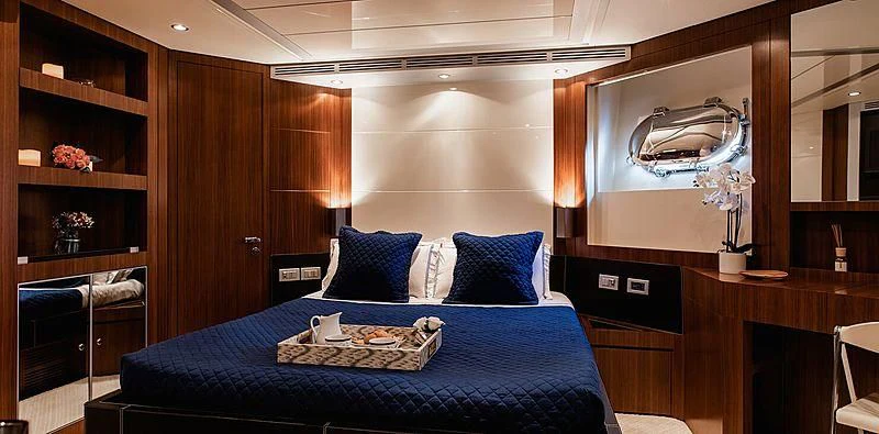 a bed in a room aboard BEYOND Yacht for Charter