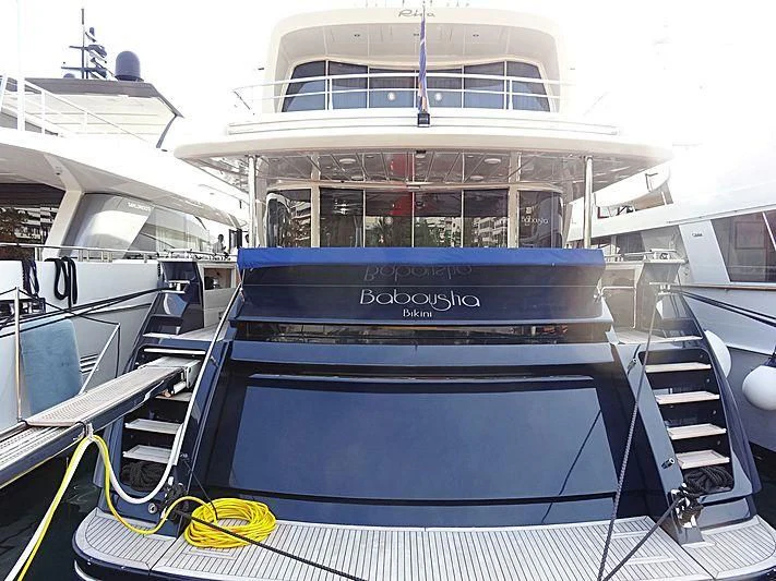 a boat with a deck aboard BEYOND Yacht for Charter