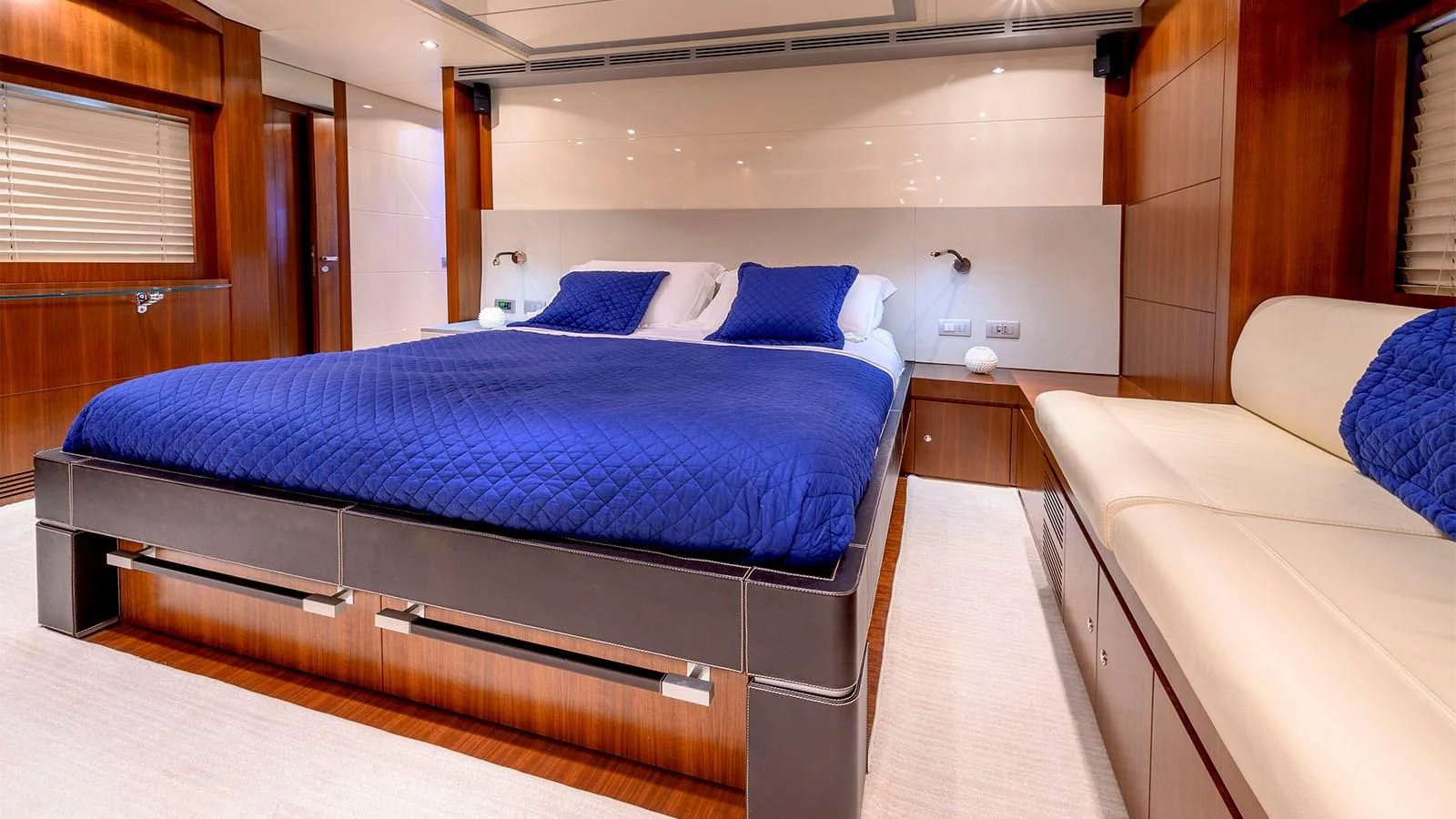 a bed in a room aboard BEYOND Yacht for Charter