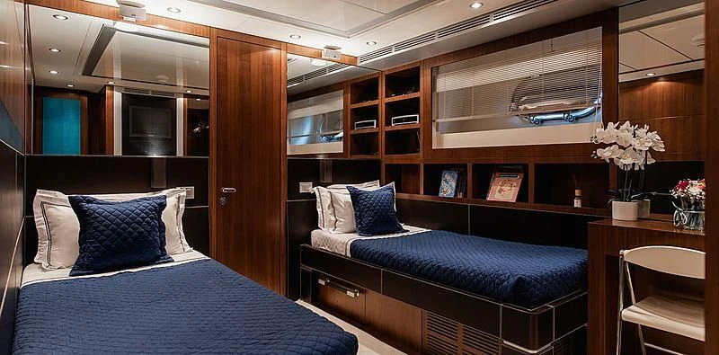 a bed in a room aboard BEYOND Yacht for Charter