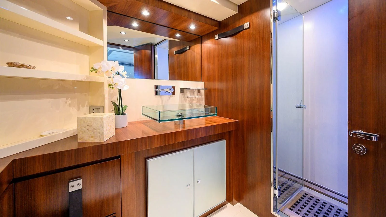 a room with a counter and cabinets aboard BEYOND Yacht for Charter