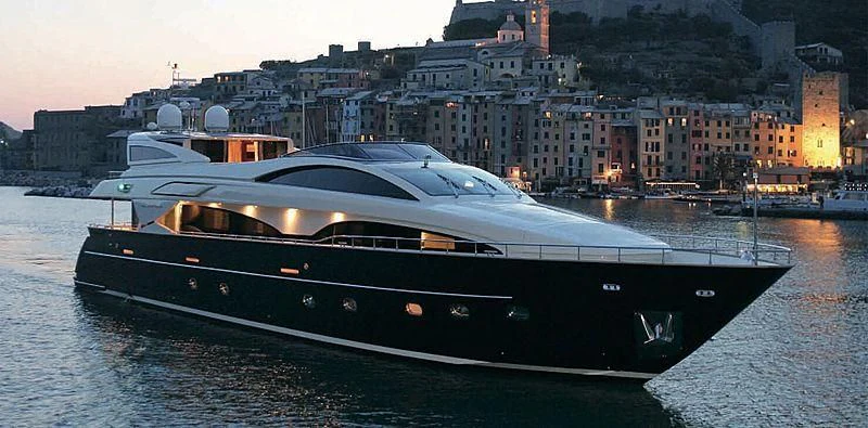 a large boat on a river aboard BEYOND Yacht for Charter