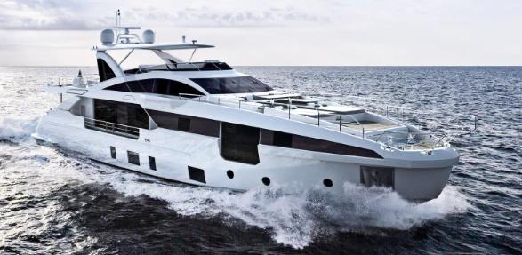 a white yacht on the water aboard FREEDOME Yacht for Sale