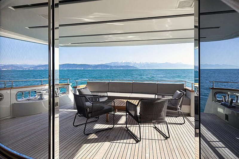 a room with a table and chairs aboard THE UNIFIER KING ABDULAZIZ THE FIRST Yacht for Sale