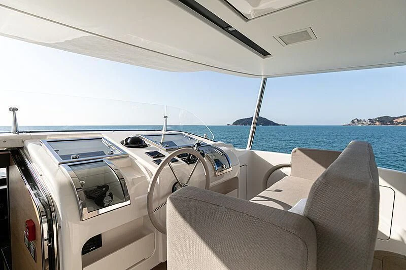 a boat on the water aboard THE UNIFIER KING ABDULAZIZ THE FIRST Yacht for Sale