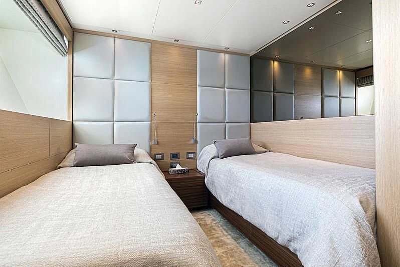 a room with two beds aboard THE UNIFIER KING ABDULAZIZ THE FIRST Yacht for Sale