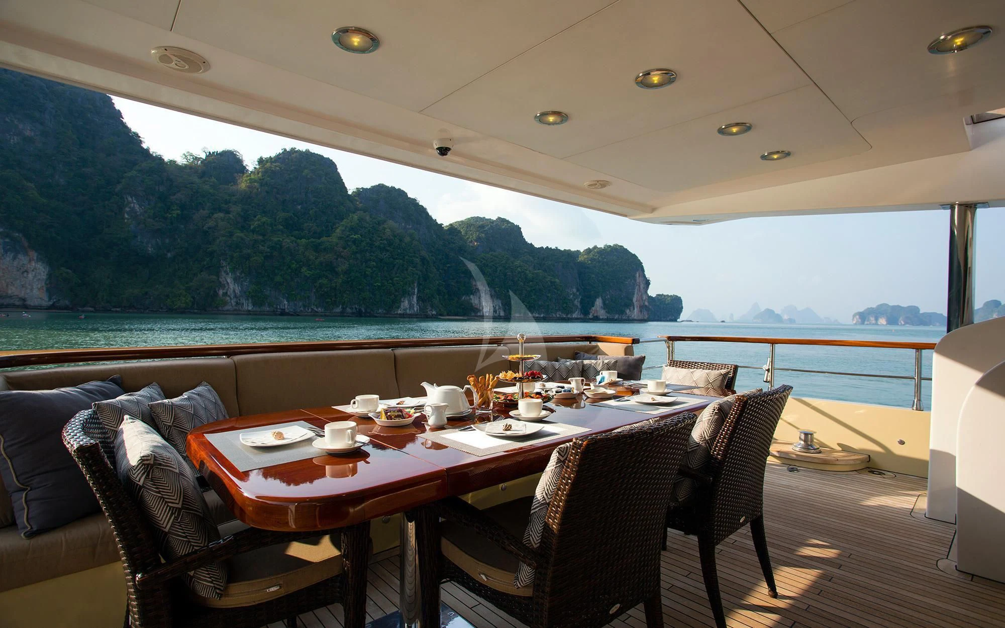 a table set for a meal aboard MIA KAI Yacht for Charter