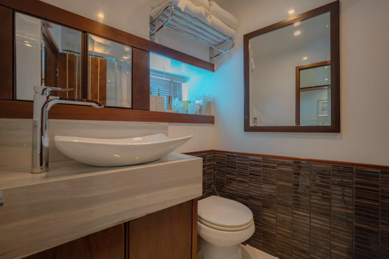 a bathroom with a sink and a toilet aboard MIA KAI Yacht for Charter