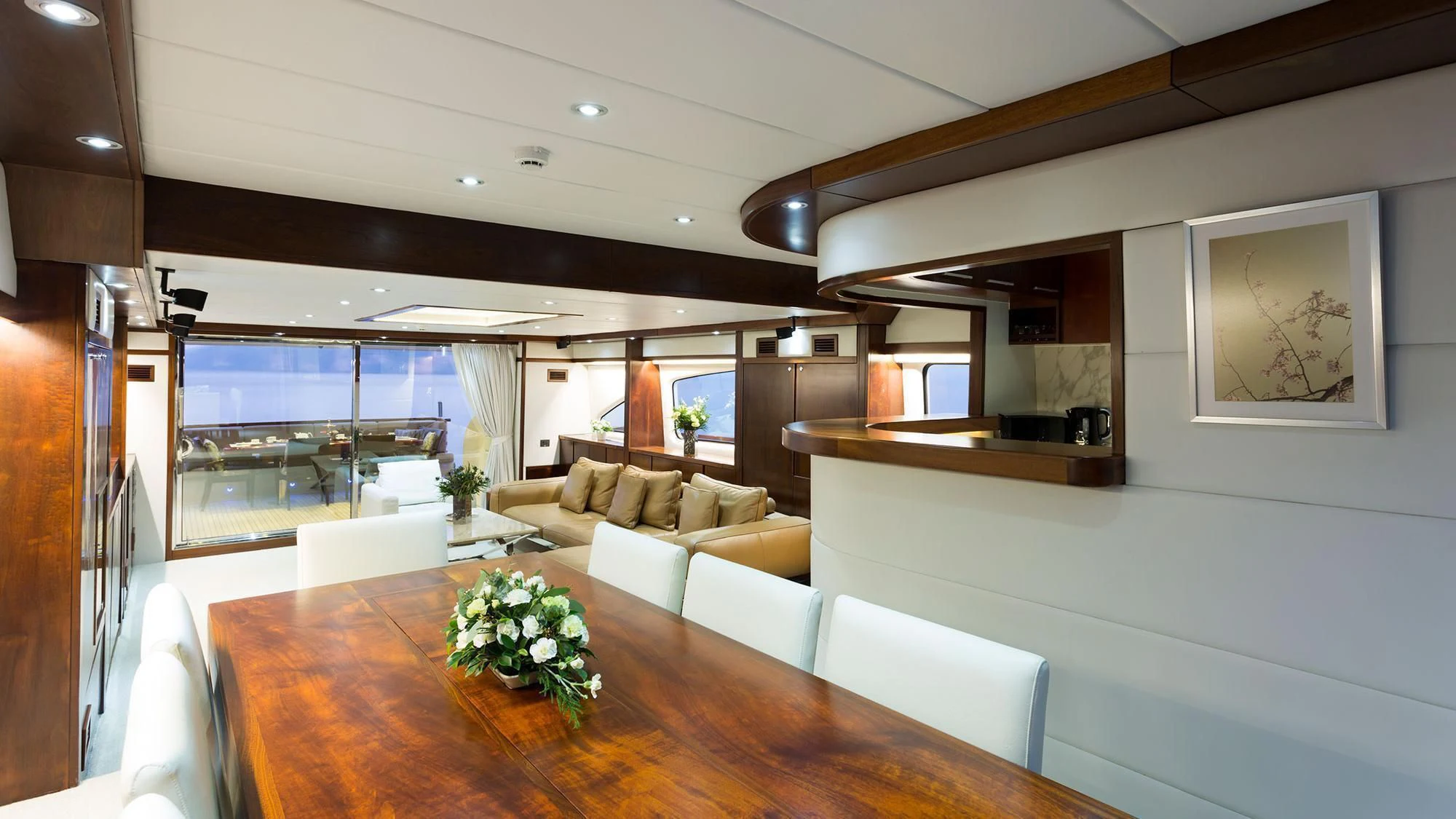 a living room with a large window aboard MIA KAI Yacht for Charter