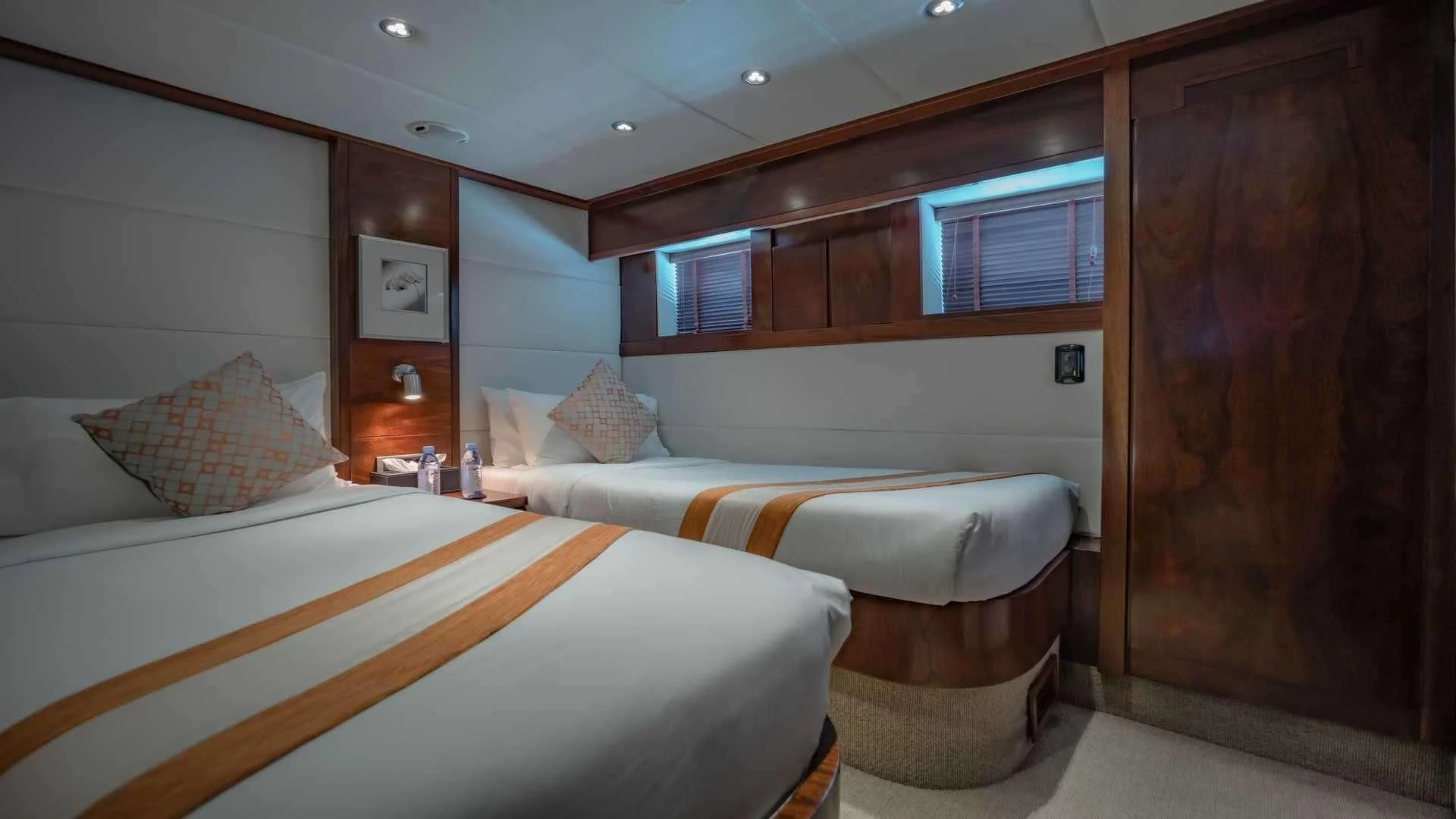 a room with two beds aboard MIA KAI Yacht for Charter