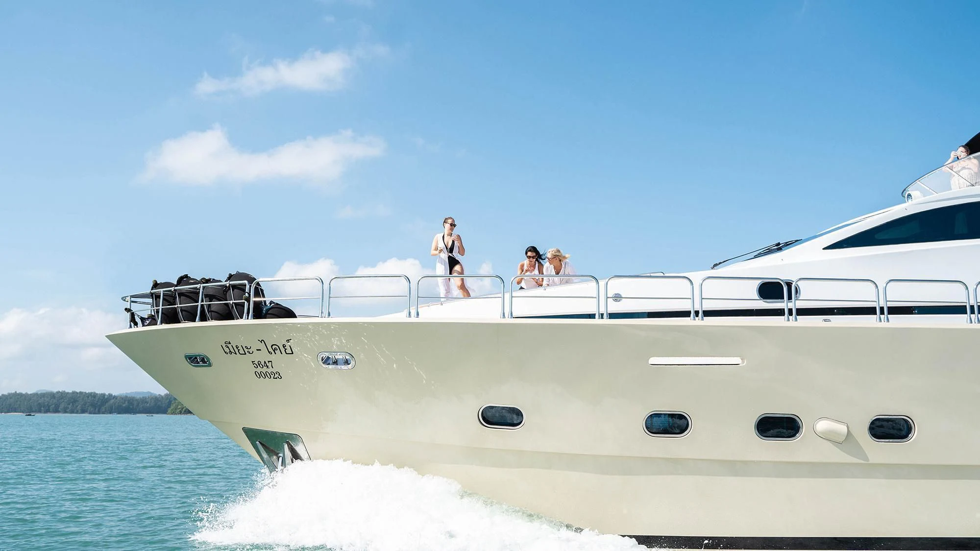 a boat with people on it aboard MIA KAI Yacht for Charter