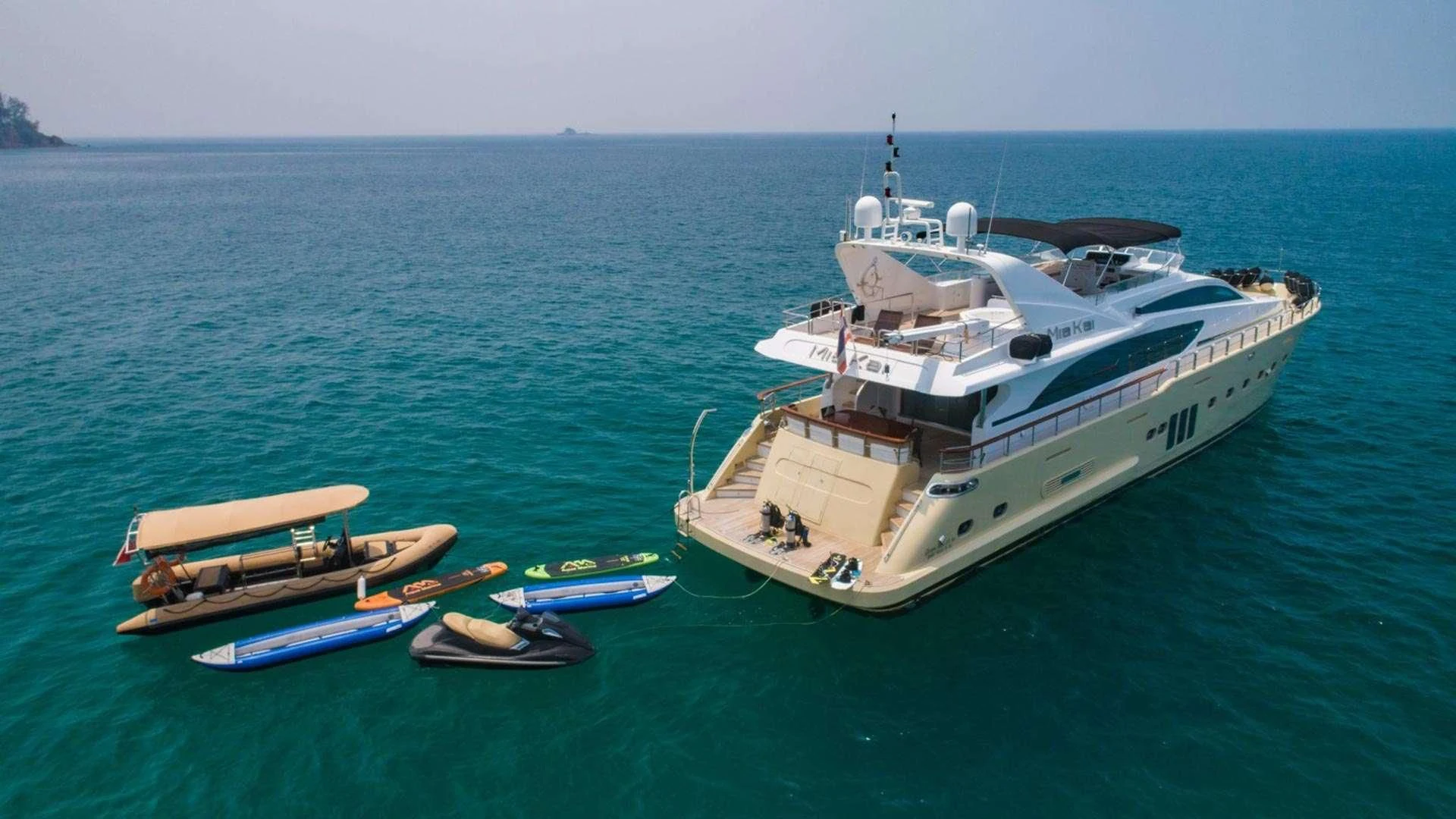 a large ship in the water aboard MIA KAI Yacht for Charter
