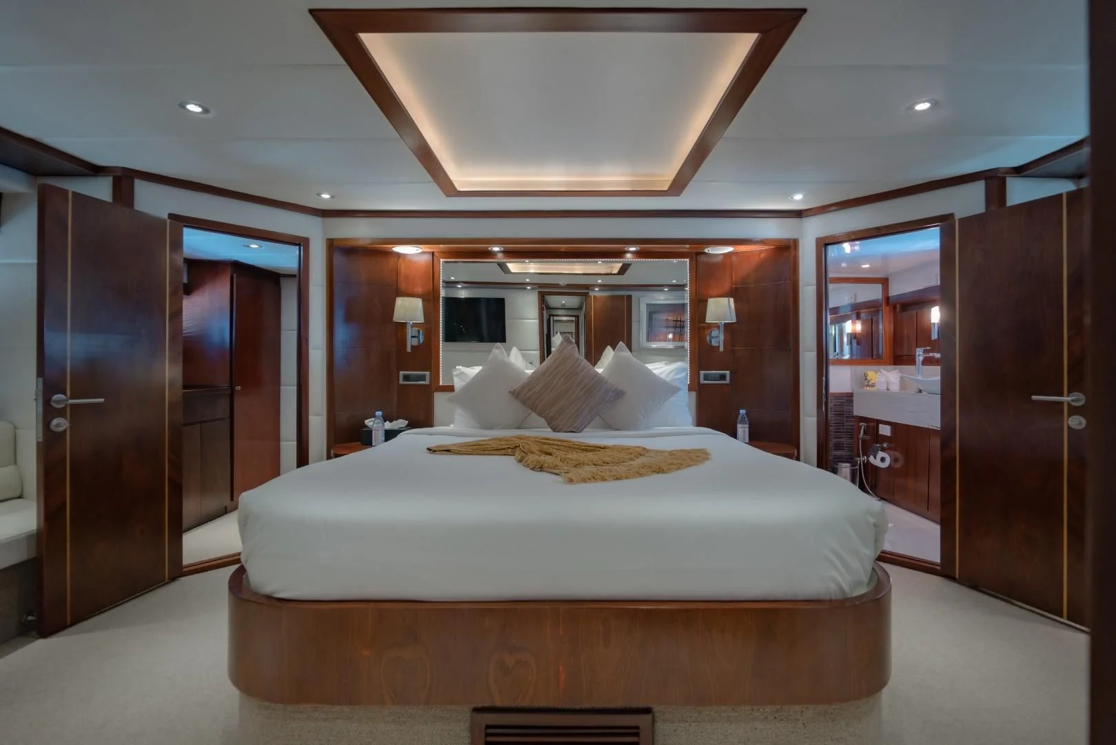 a bed in a hotel room aboard MIA KAI Yacht for Charter