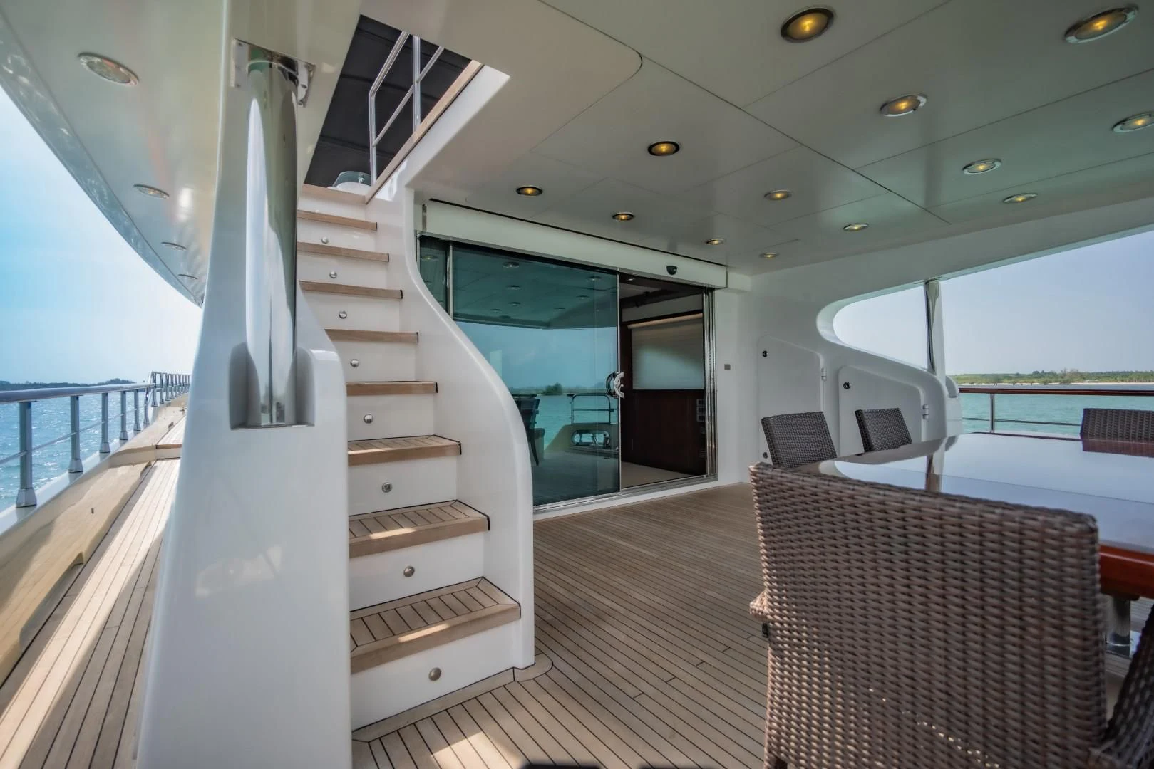 a boat with a staircase aboard MIA KAI Yacht for Charter