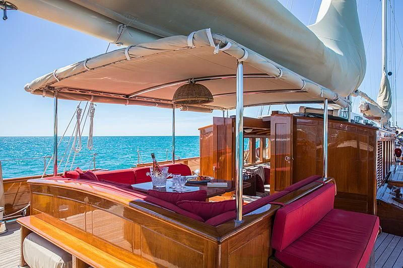 a boat with a canopy aboard ADELA Yacht for Sale