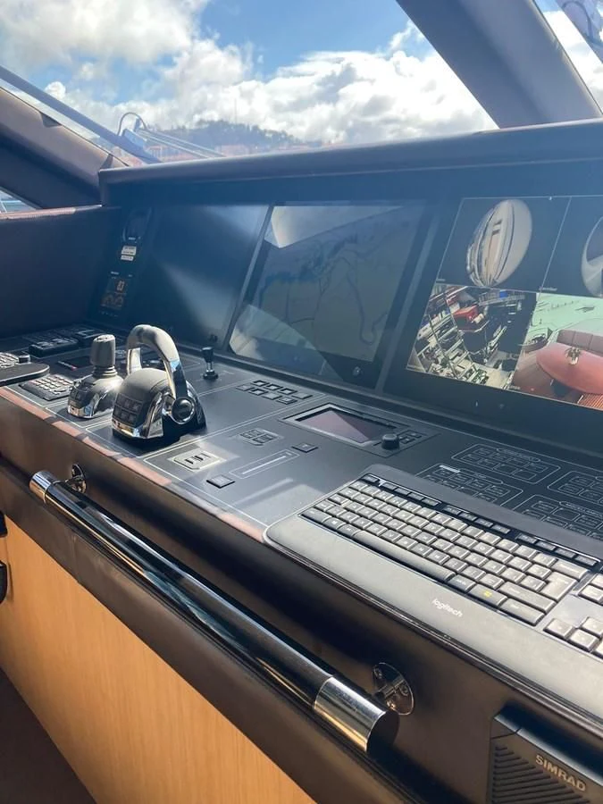 a laptop with a screen and a keyboard aboard O NOSO UNO Yacht for Sale