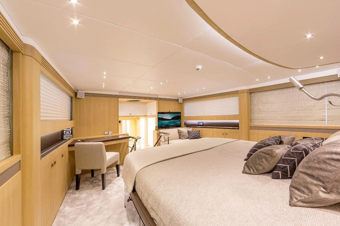 a bedroom with two beds aboard O NOSO UNO Yacht for Sale