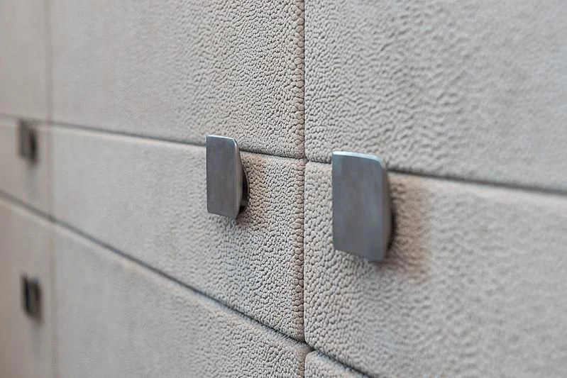 a close-up of a grey tile wall aboard O NOSO UNO Yacht for Sale