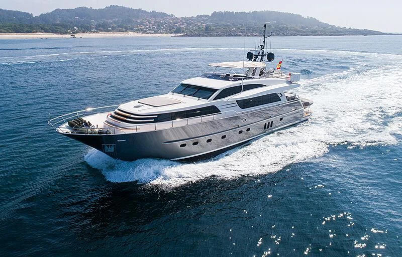 a white yacht on the water aboard O NOSO UNO Yacht for Sale