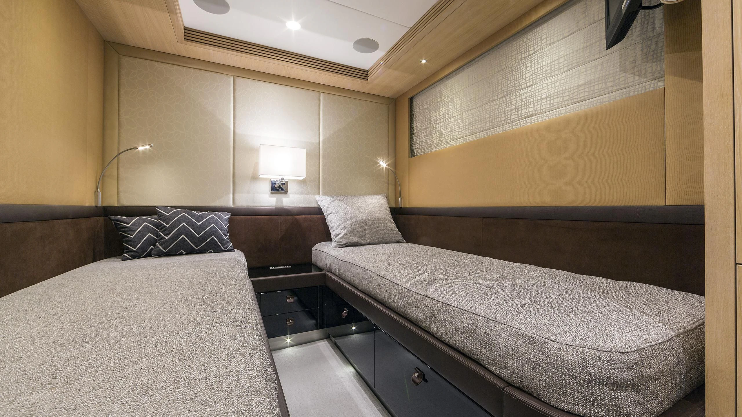 a room with two beds aboard O NOSO UNO Yacht for Sale