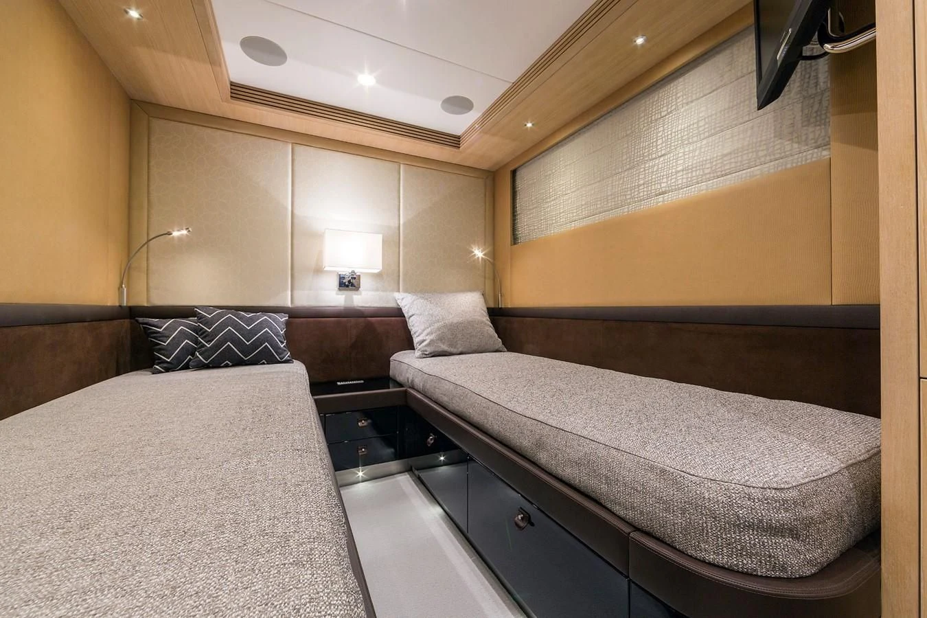 a room with two beds aboard O NOSO UNO Yacht for Sale