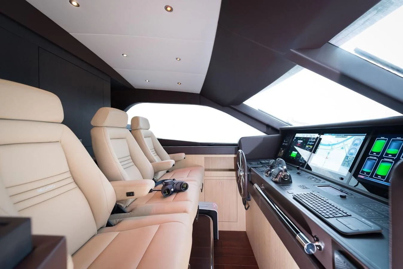 a person in a car aboard O NOSO UNO Yacht for Sale