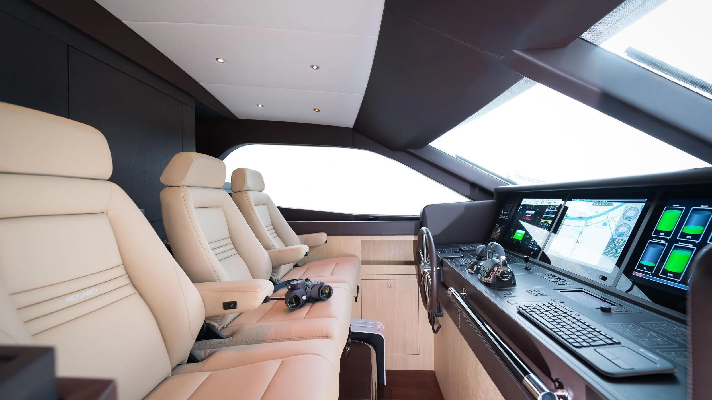 a person in a car aboard O NOSO UNO Yacht for Sale