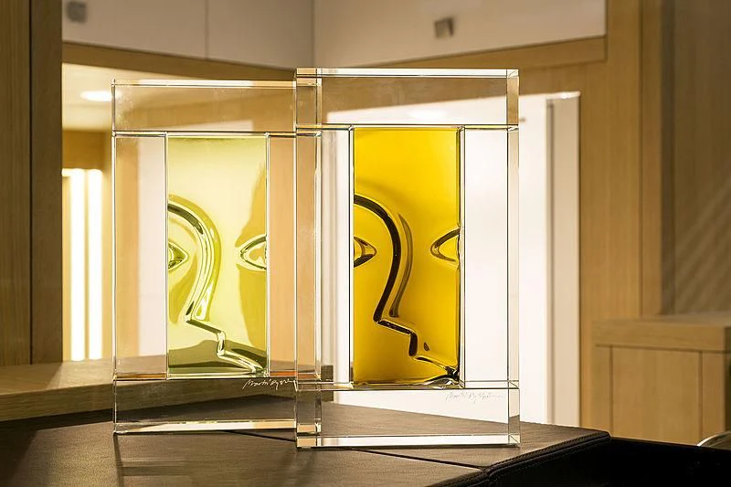 a glass door with a yellow sign aboard O NOSO UNO Yacht for Sale