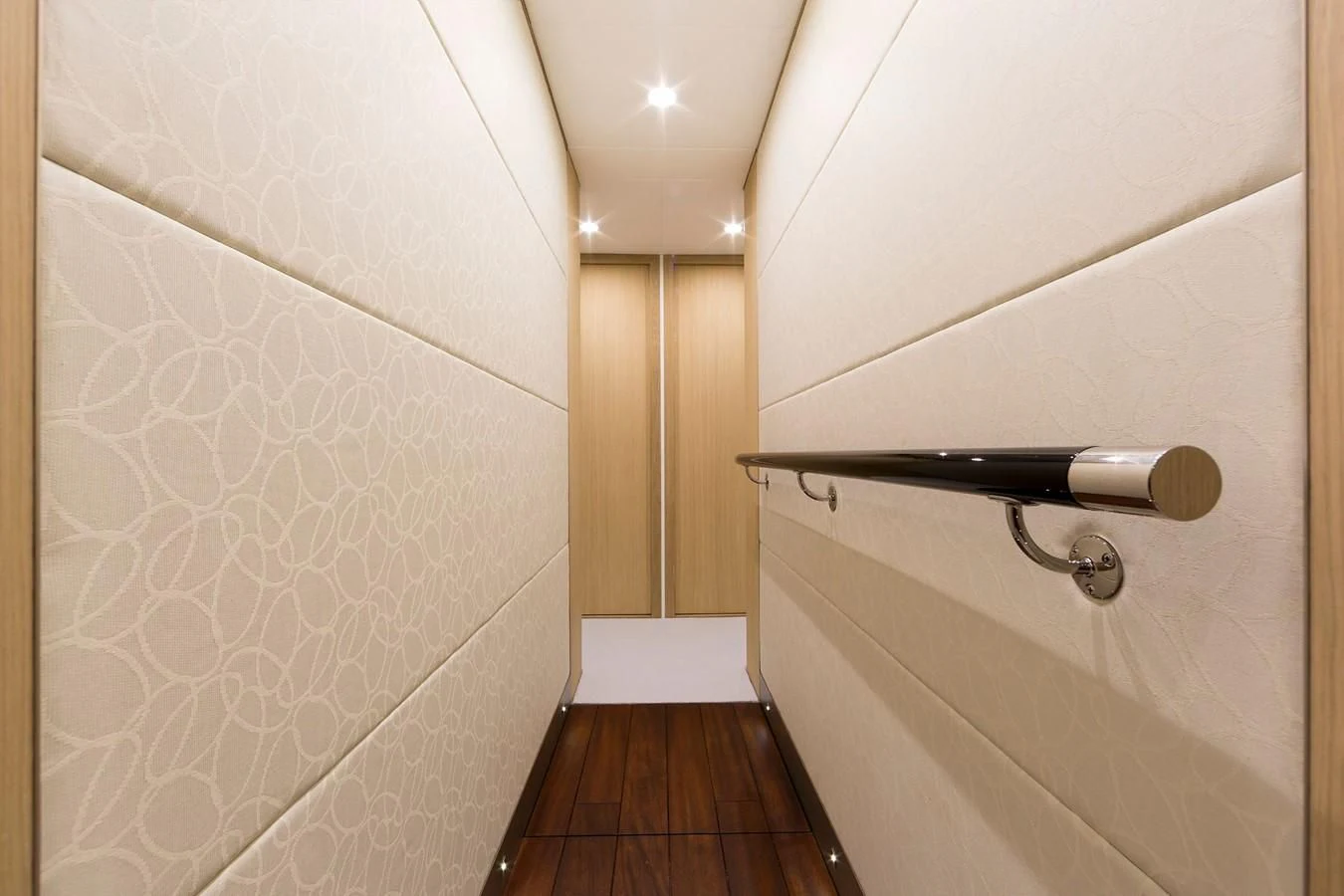 a bathroom with a wood floor aboard O NOSO UNO Yacht for Sale