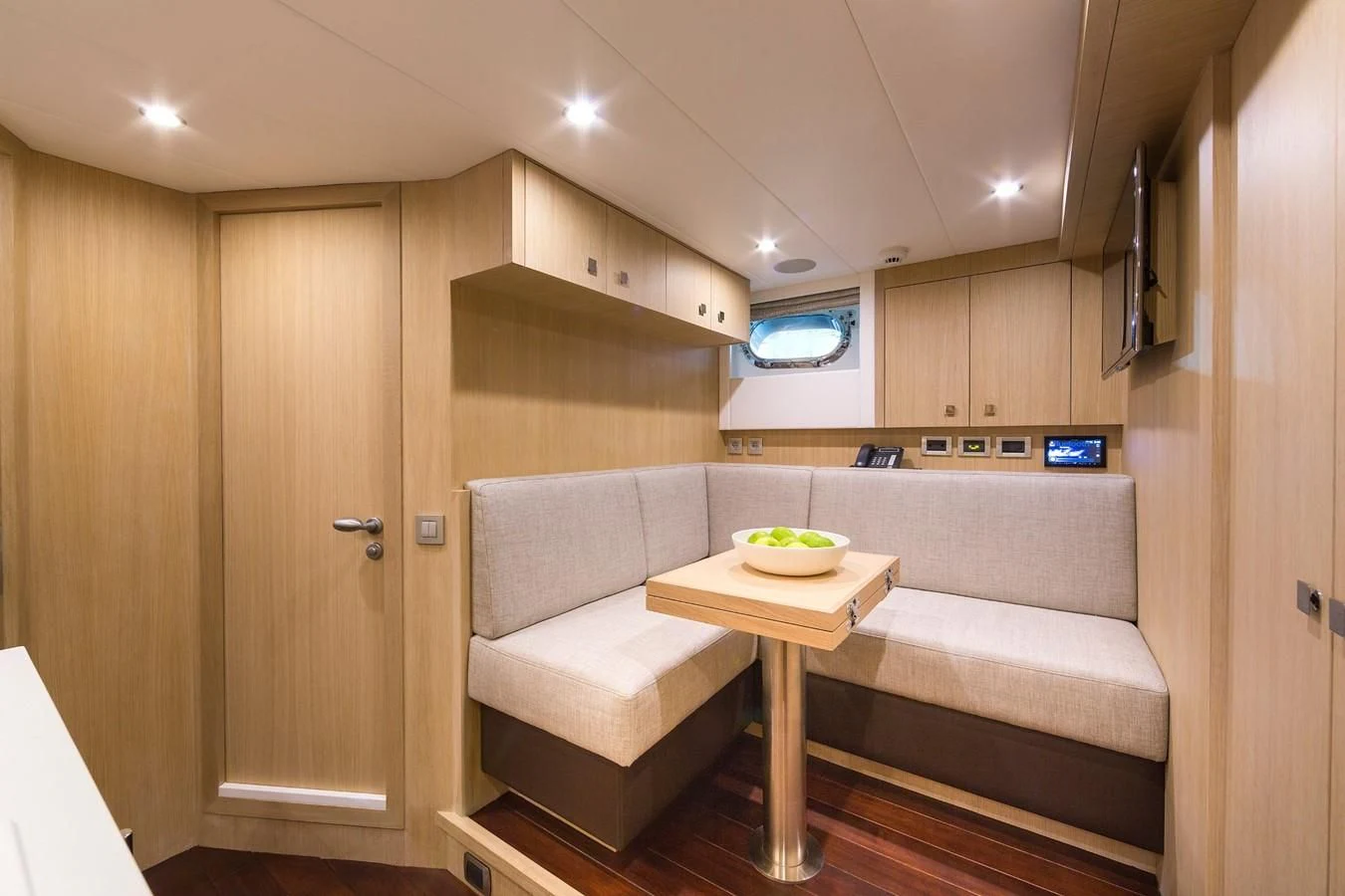 a room with a couch and a table aboard O NOSO UNO Yacht for Sale