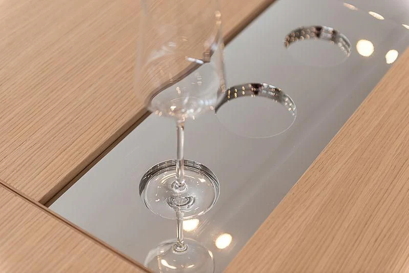 a close-up of a wine glass aboard O NOSO UNO Yacht for Sale