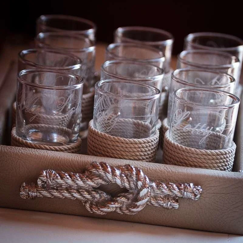 a snake in front of a group of glass containers aboard LOTTY Yacht for Sale