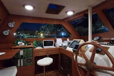 a room with a desk and a computer aboard LOTTY Yacht for Sale