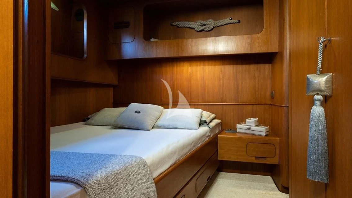 a bed in a room aboard LOTTY Yacht for Sale