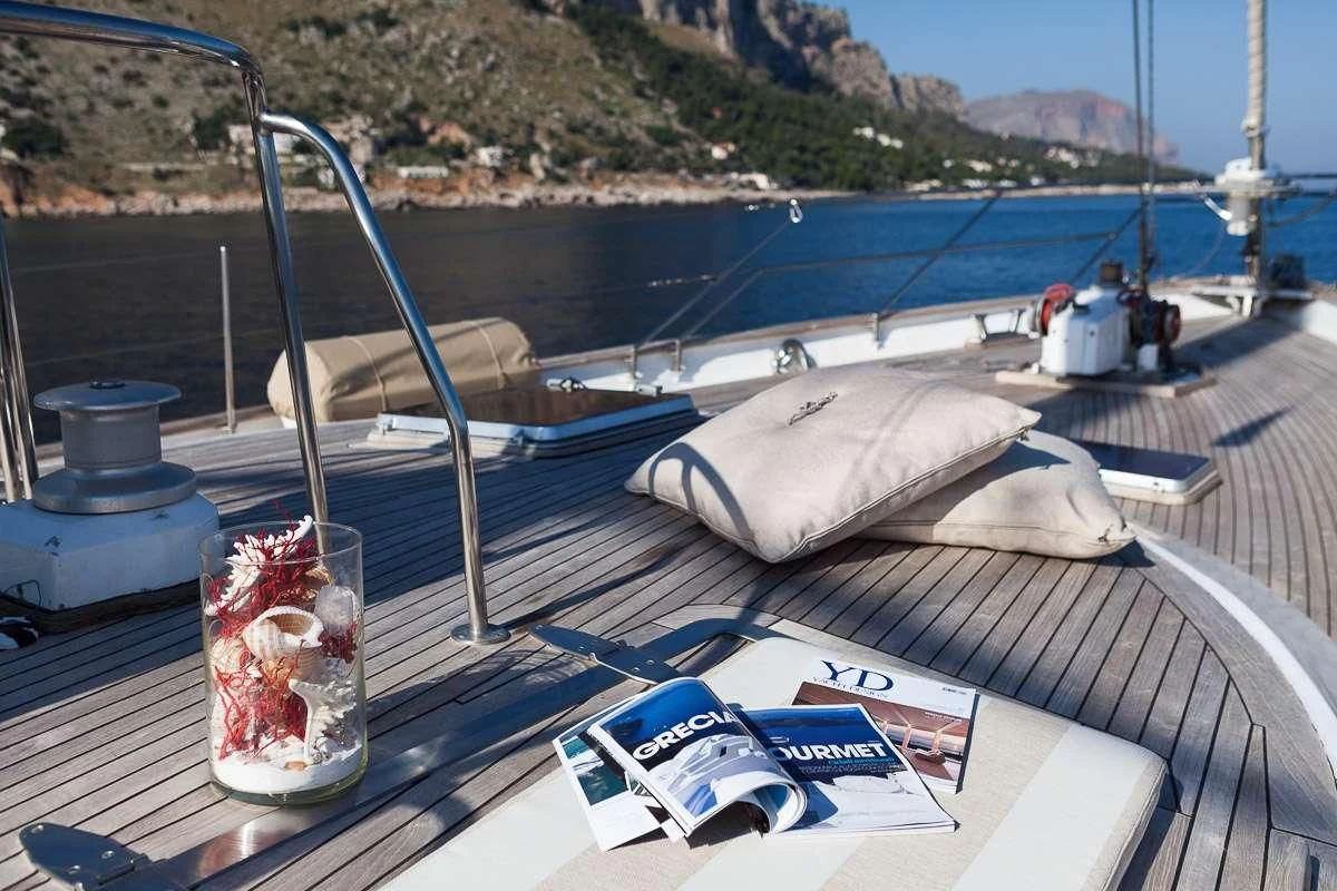a glass of beer on a boat aboard LOTTY Yacht for Sale
