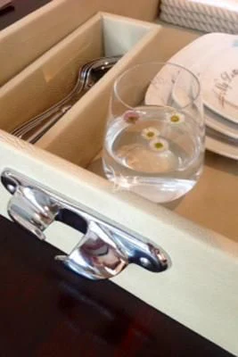 a glass cup with a spoon in it aboard LOTTY Yacht for Sale