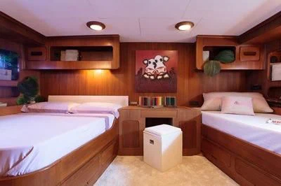 a room with two beds aboard LOTTY Yacht for Sale
