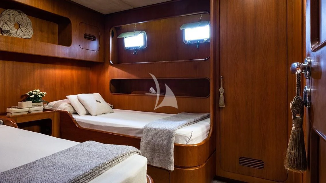 a room with two beds aboard LOTTY Yacht for Sale