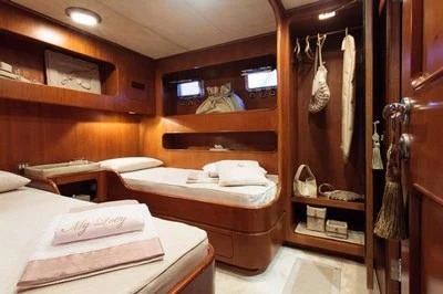 a room with bunk beds aboard LOTTY Yacht for Sale
