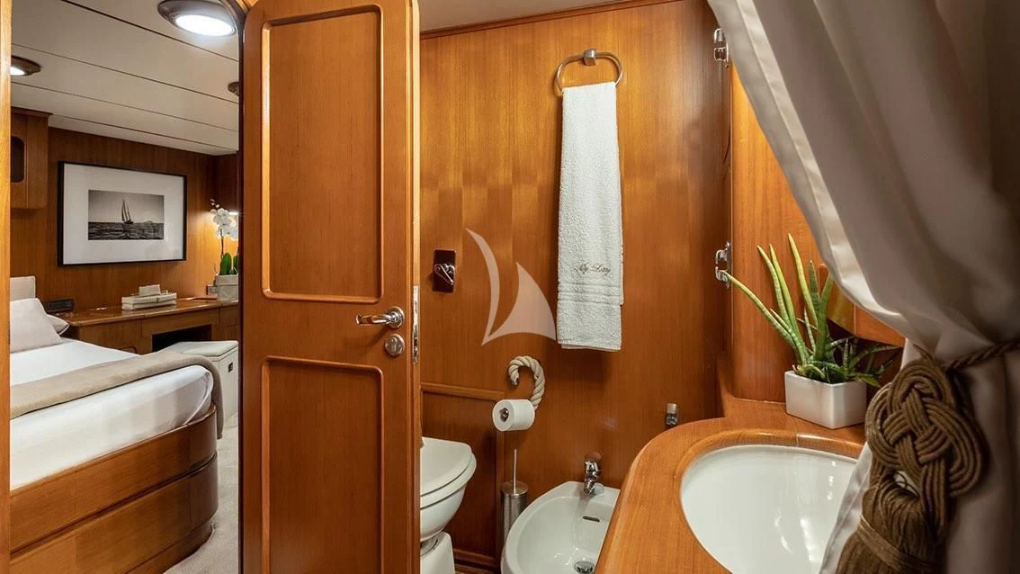 a bathroom with a sink and toilet aboard LOTTY Yacht for Sale