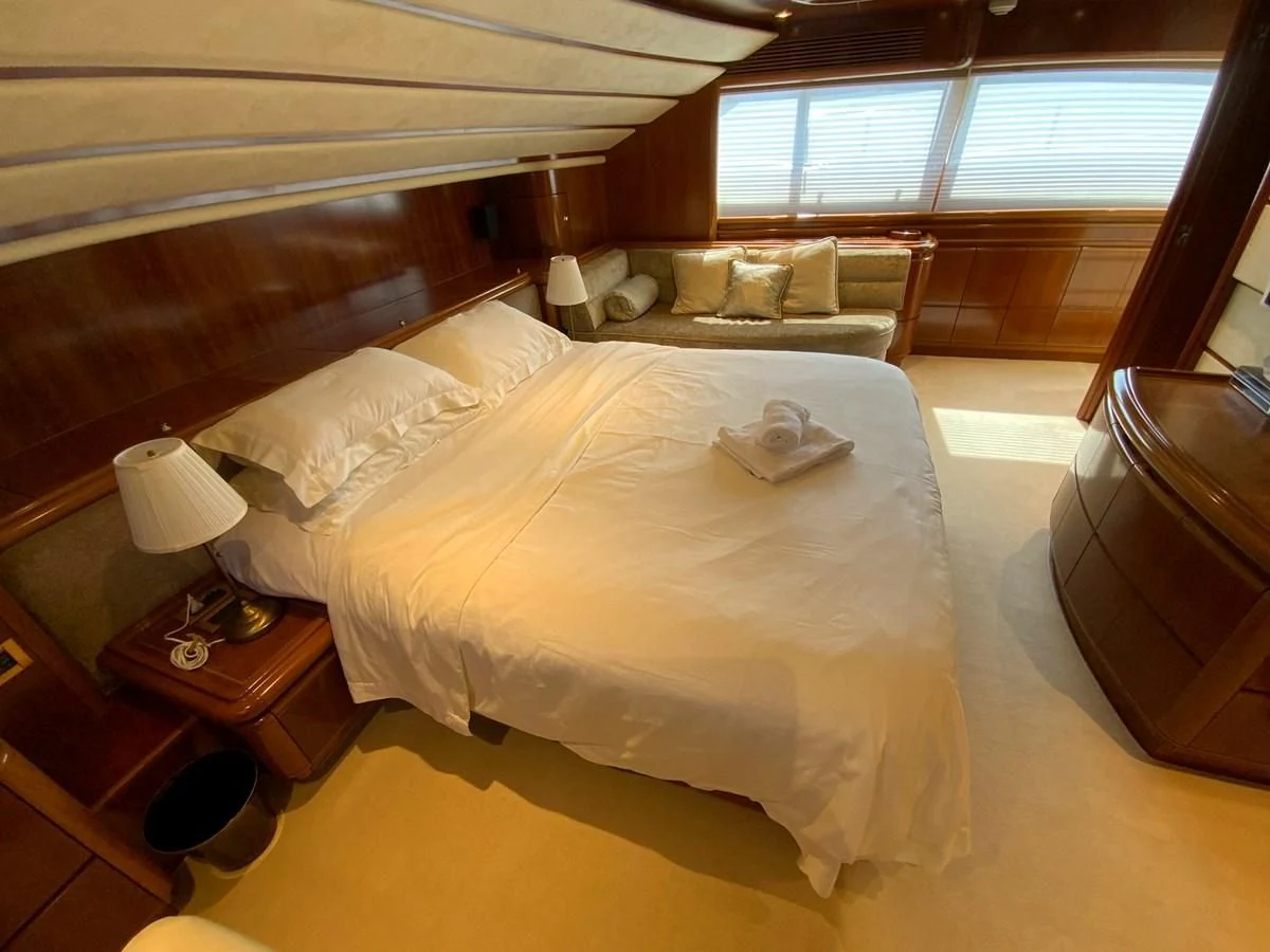 a bed in a room aboard GEMINI Yacht for Sale