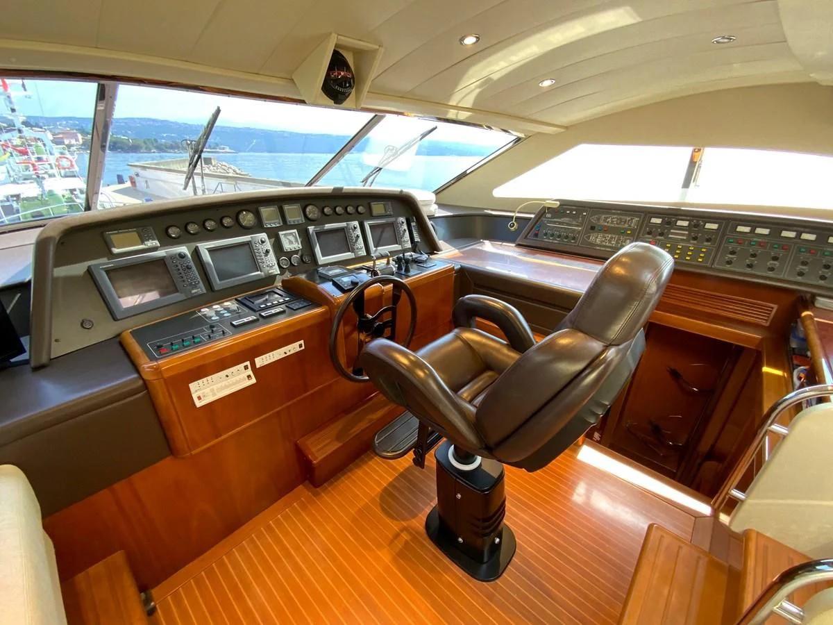 a car with a steering wheel aboard GEMINI Yacht for Sale