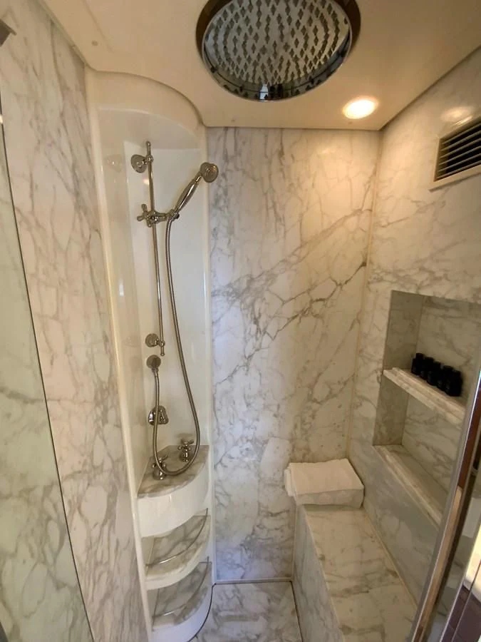 a shower with a shower head aboard GEMINI Yacht for Sale
