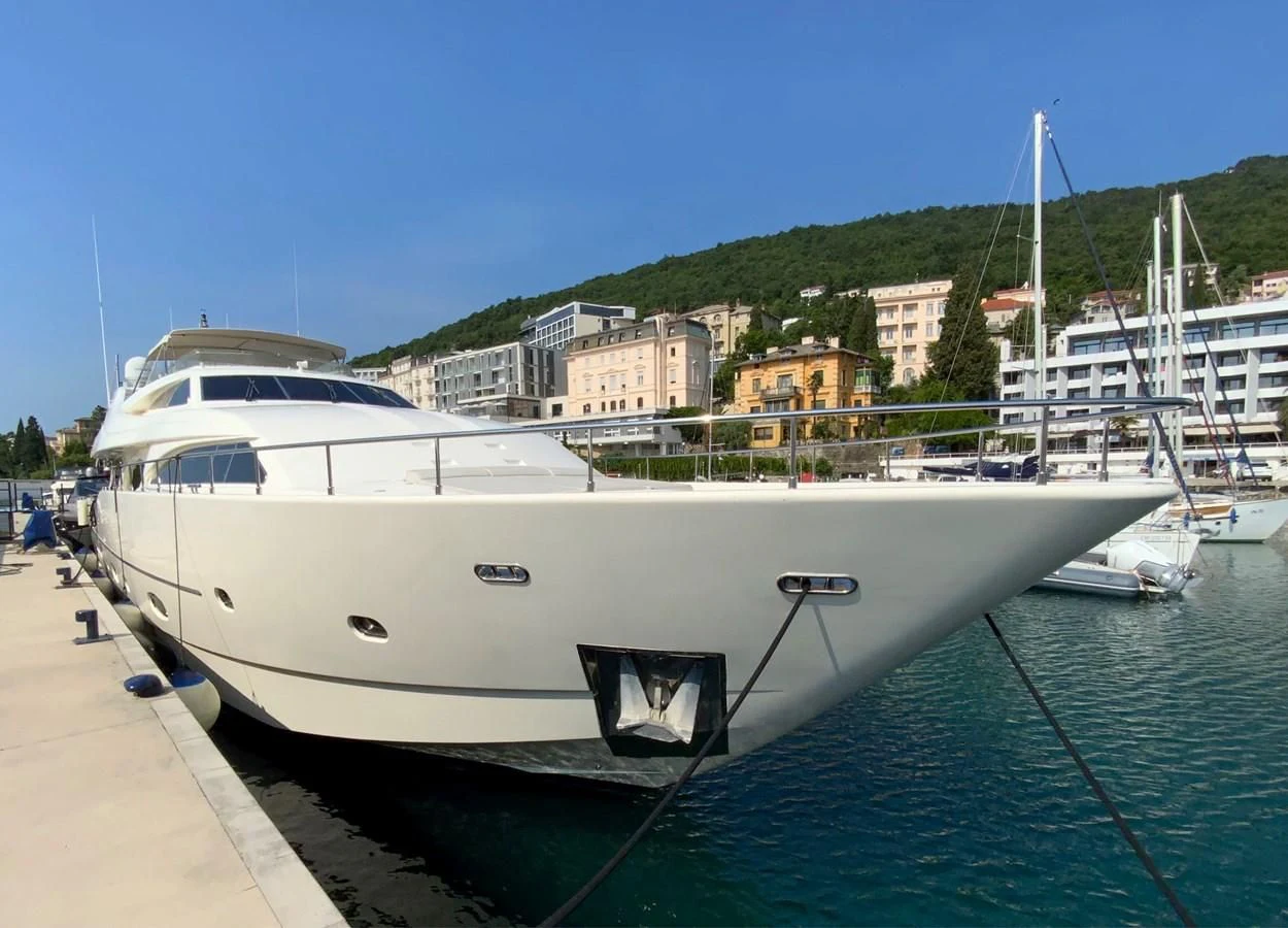 a boat docked at a pier aboard GEMINI Yacht for Sale