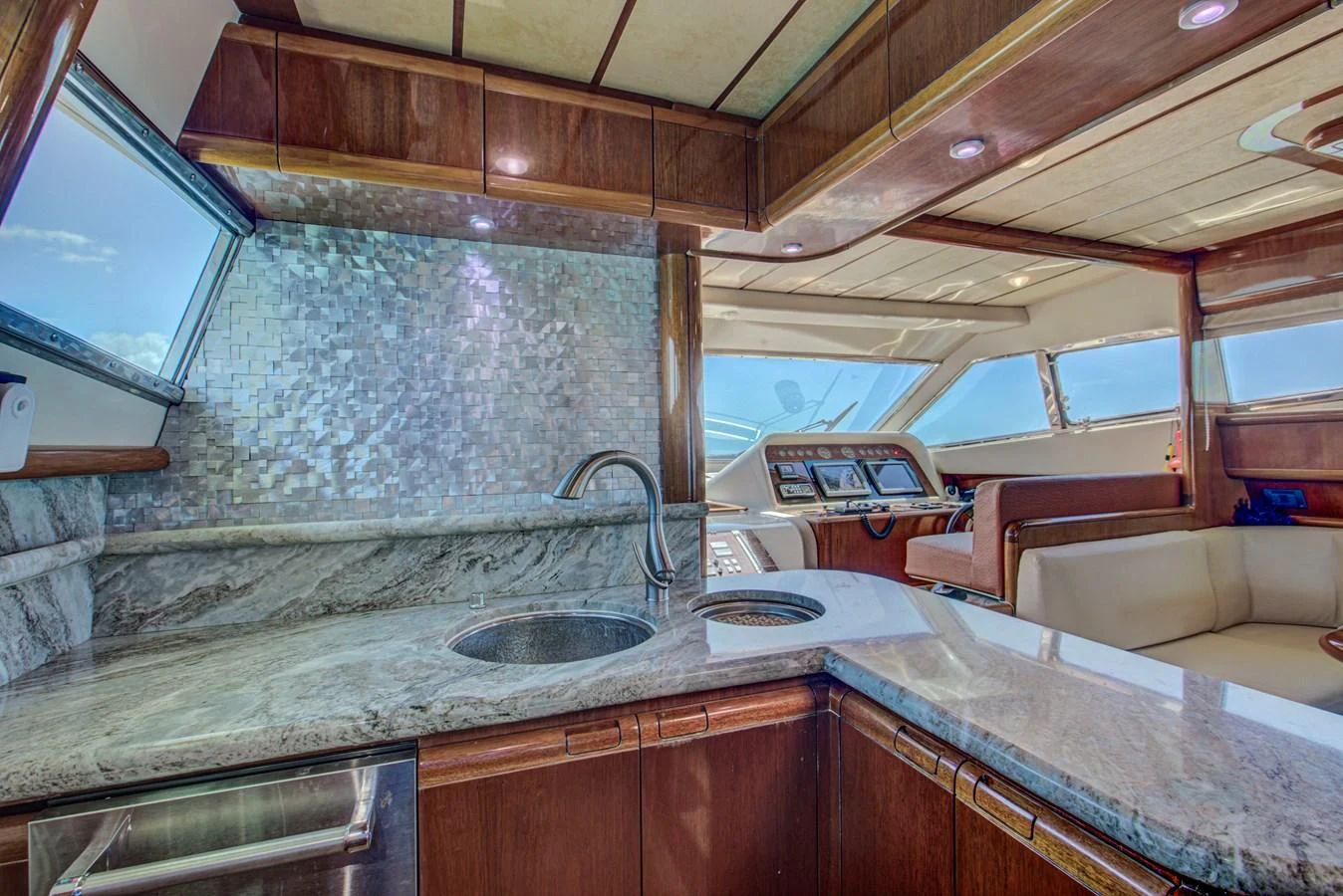 a kitchen with a large countertop aboard FERRETTI Yacht for Sale