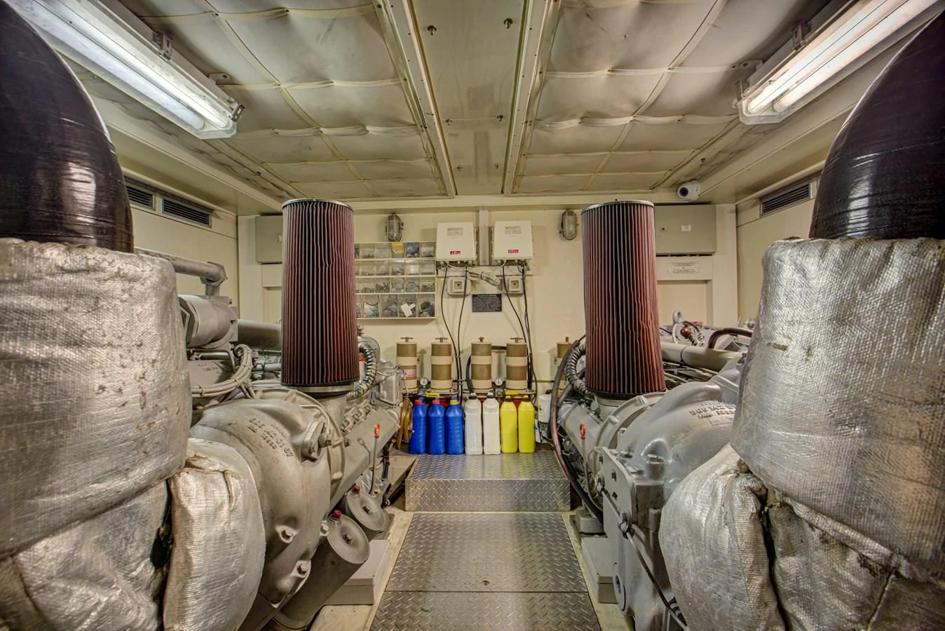 a room with several large pipes aboard FERRETTI Yacht for Sale