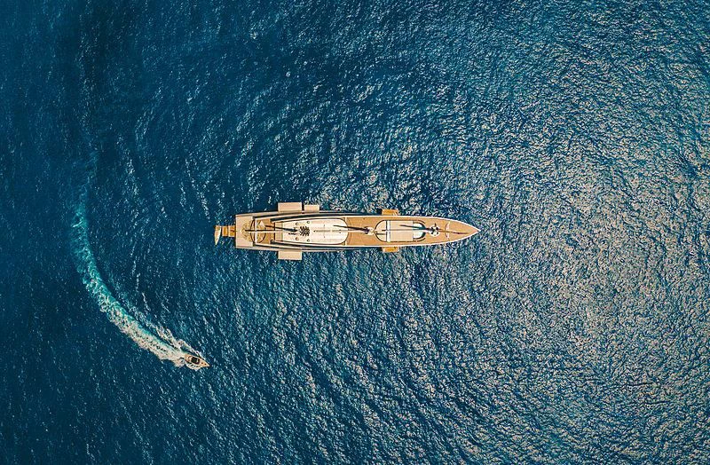 a plane flying over a body of water aboard SAILING YACHT A Yacht for Sale
